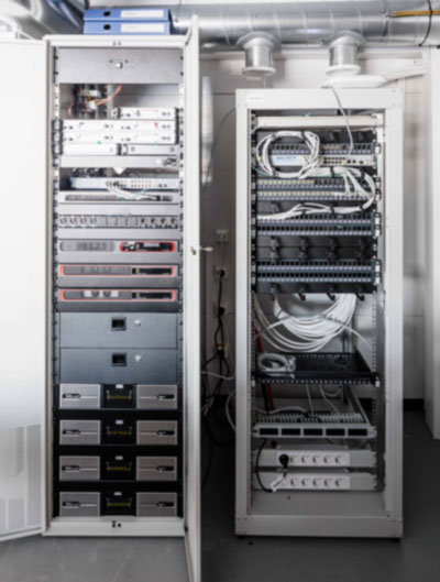 Equipment racks at Imatra Stadium, with four Powersoft Ottocanali amplifiers at the base of the left rack