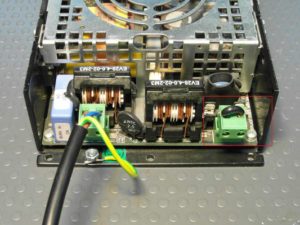 DigiMod module wired for 110 V: mains cable in the left connector, jumper in the 2-pole connector outlined in red