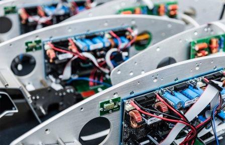 Sonus Faber chassis plates lined up with amplifier electronics mounted