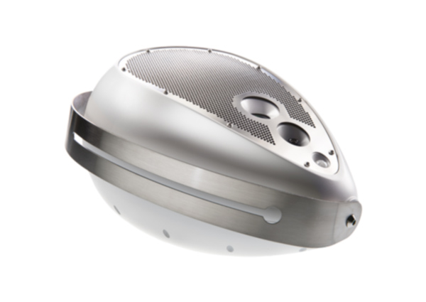 Deva multimedia unit: white egg-shaped enclosure with perforated grille, lens openings and a metal band