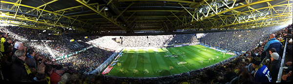 Signal Iduna Park rack with two Powersoft Ottocanali amplifiers above an X8 and a fiber patch panel