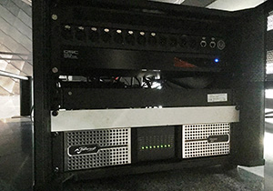 Rack at Les Champs Libres with a QSC unit and a Powersoft Ottocanali 4K4 amplifier