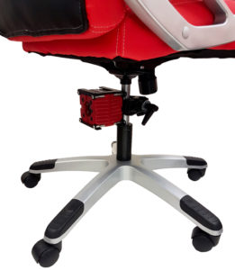 Red MeMo transducer mounted on the base column of a gaming chair