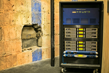 Rack with eight Powersoft amplifiers: six Duecanali, one K Series and one M Series