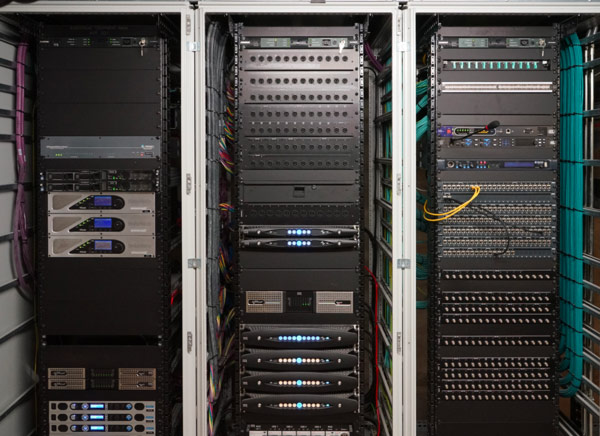 Technical room at Queen Elisabeth Hall: three racks with Powersoft amplifiers and patch panels