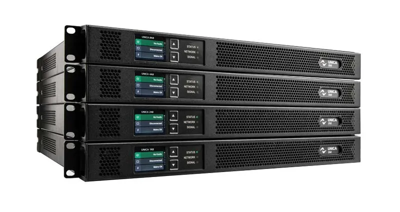 Four UNICA 8M amplifiers stacked, front panels with display and status LEDs
