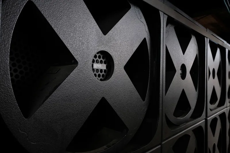Rat Sound SuperSub subwoofers stacked, close-up of the X-shaped grilles