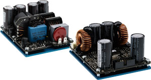 Two Powersoft D-Cell504 circuit boards with capacitors and inductors