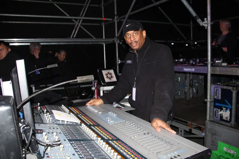 Sound engineer at a mixing console inside a scaffolding structure, JLO Dancing Again World Tour in Poland