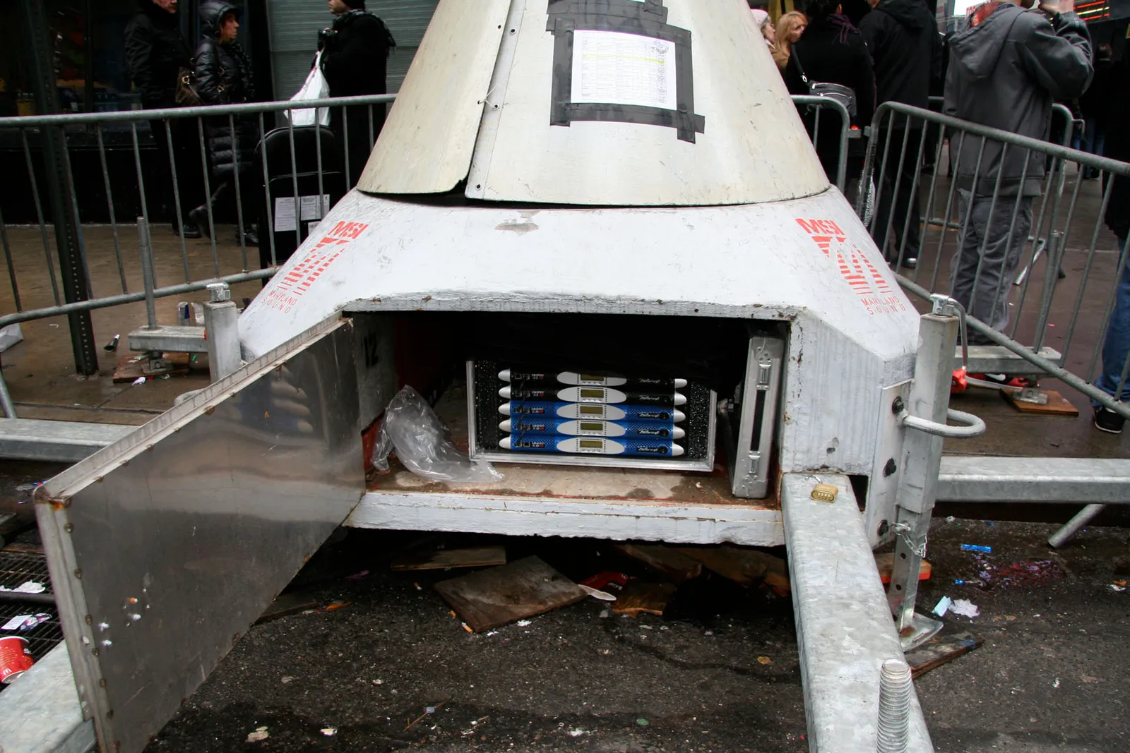 Open base of a Maryland Sound speaker tower in Times Square, housing a rack of five Powersoft amplifiers