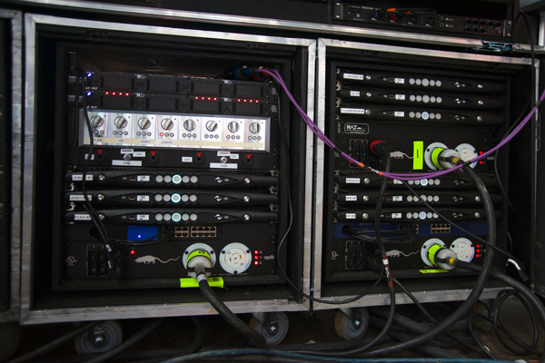Monitor rack cases with Powersoft X4 amplifiers labeled by channel, for the Red Hot Chili Peppers tour